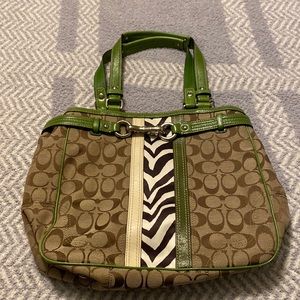 Coach purse green trim with black and white animal print down center. EUC